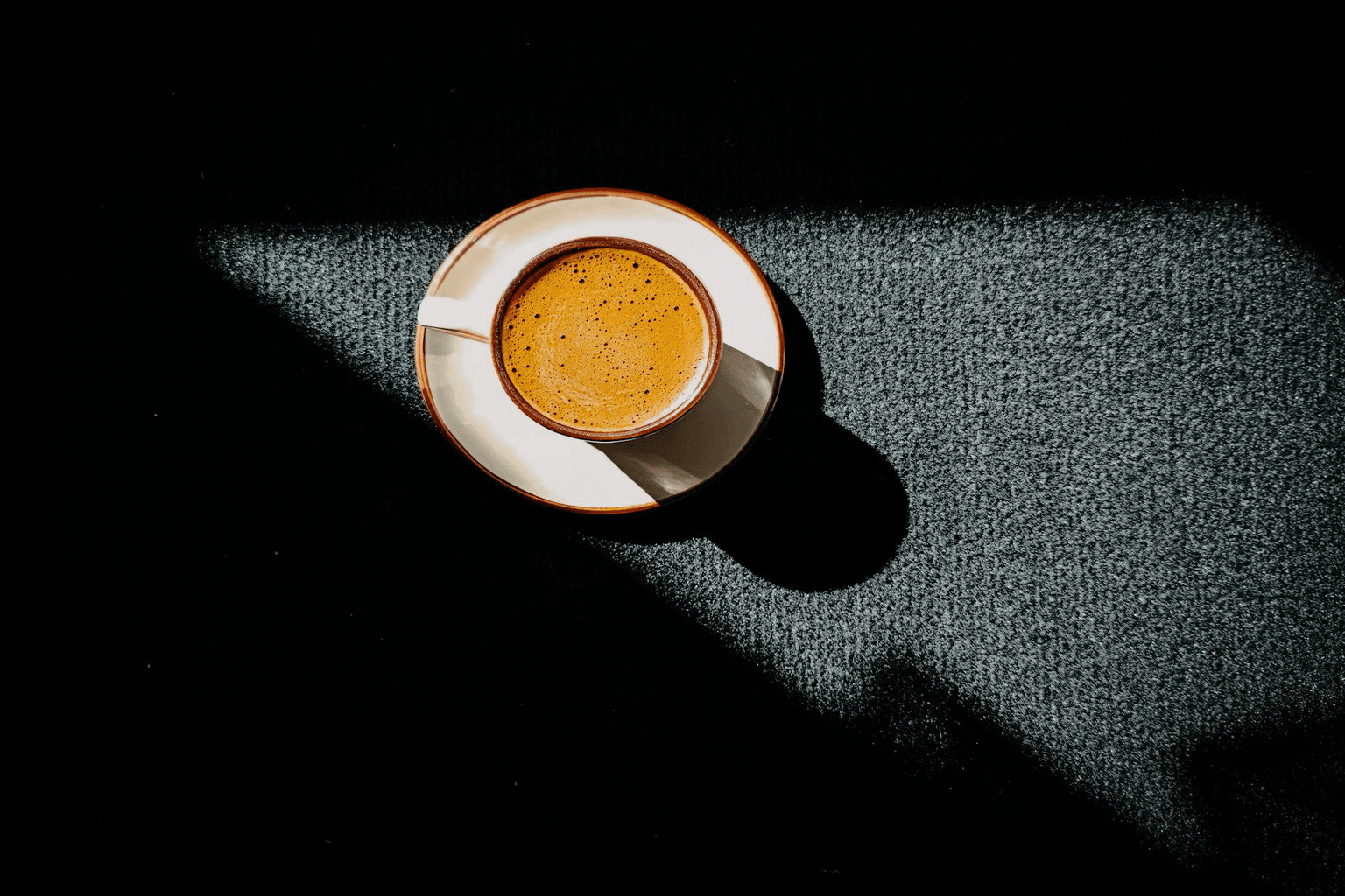 Open journal and morning coffee — building a consistent manifestation practice