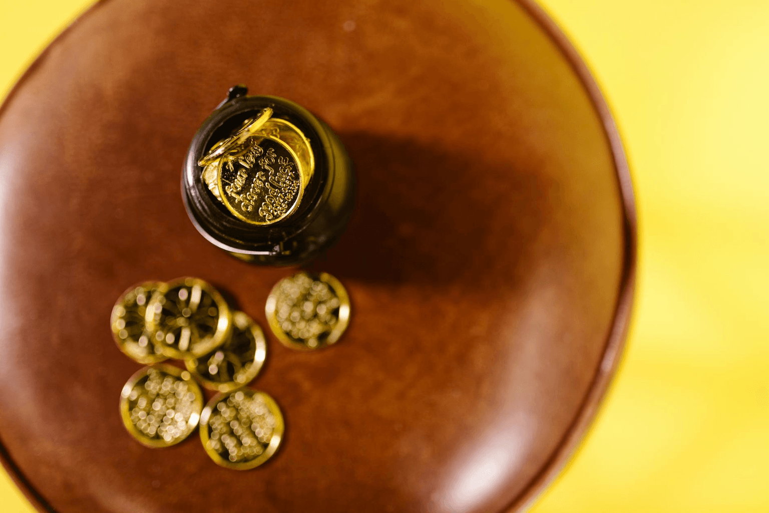 Golden coins and light rays representing unexpected financial abundance and wealth manifestation